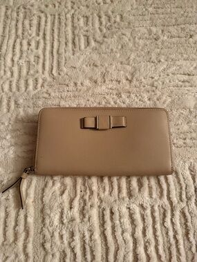 Coach Beige Saffiano Leather Zip Around Wallet Bow Detail